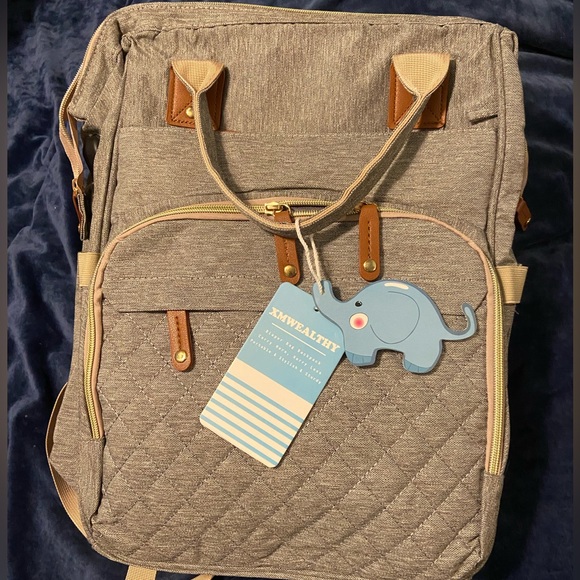NWT Convertible backpack and diaper bag with bassinet and diaper-changing pad - Picture 1 of 8